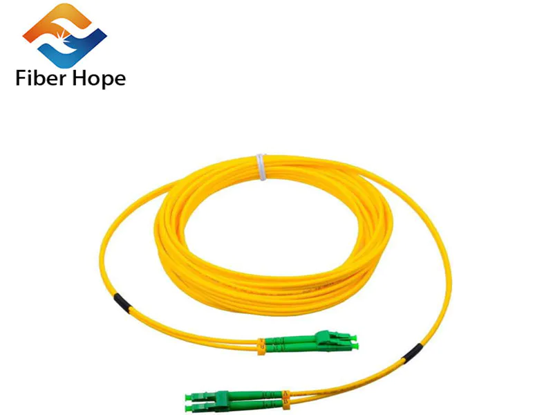 What is the proportion of material cost to total production cost for fiber optic patch cord?